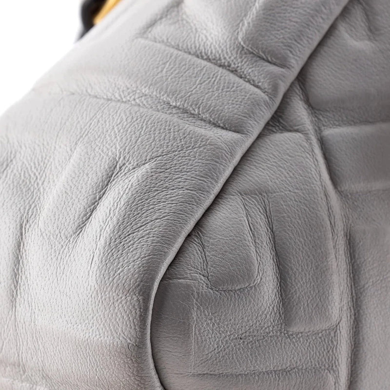Embossed Leather Baguette Bag