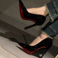 High-heeled shoes with glitter.